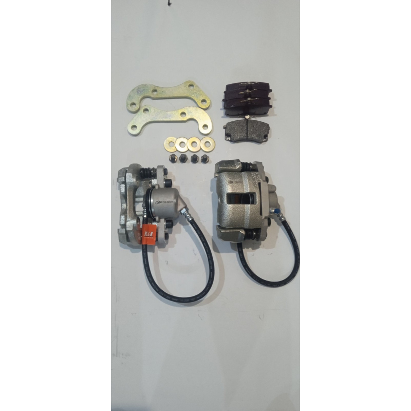 Комплект переднього гальмівного супорта для Нива 2121-2123 плавного гальмування на ниву